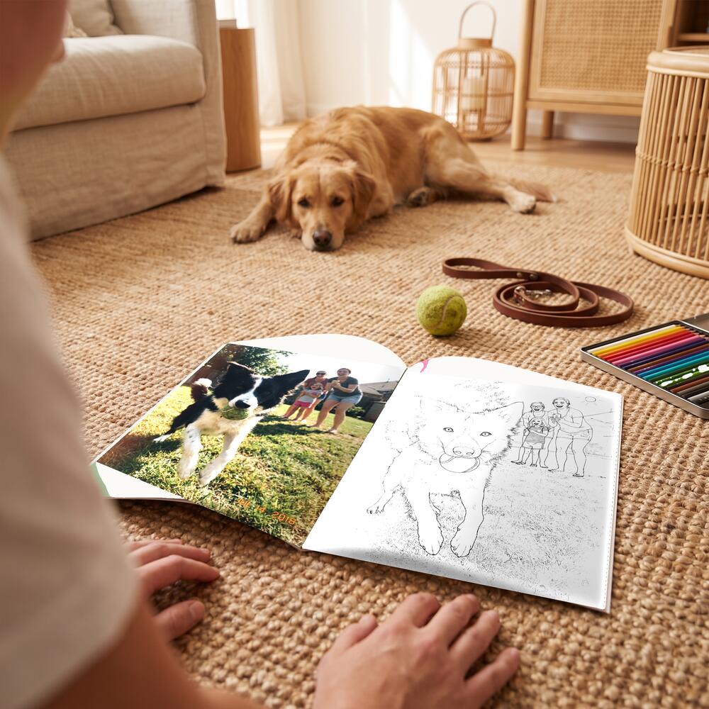 A photo on the left page and the same moment as a colouring page on the right.